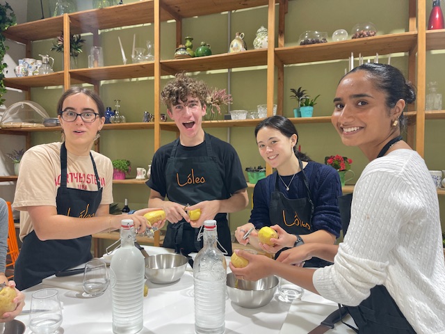 Students taking a cooking class in Madrid